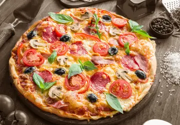 Salame e Cogumelos, mais o queijo, foram deliciosa combinação de recheio de pizza. Experimente! / GB Imagem